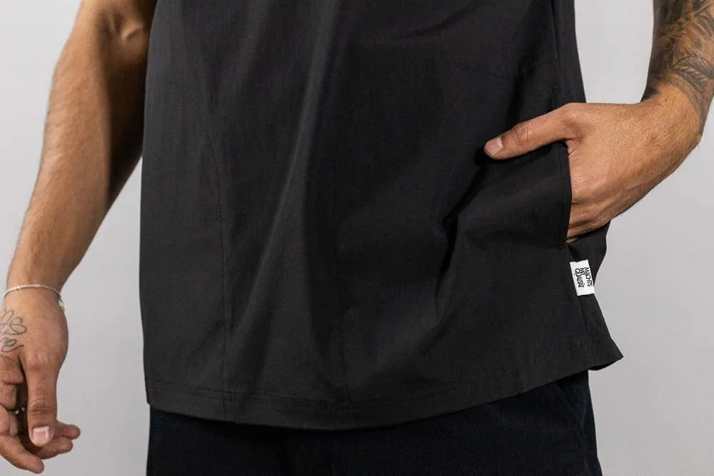 Puma MMQ SPORT Woven Relaxed Fit Tee